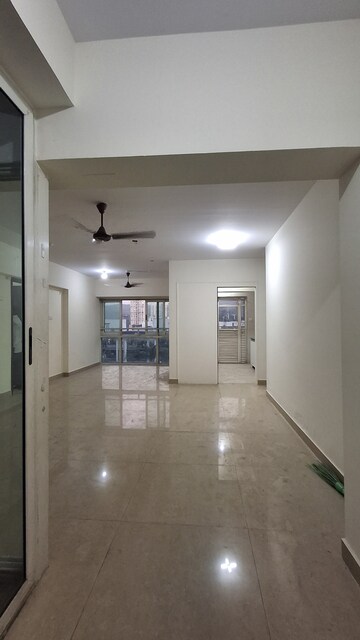 Living Room in 3 BHK Apartment at Lokhandwala Whispering Palms XXclusives, Kandivali East – for Rent