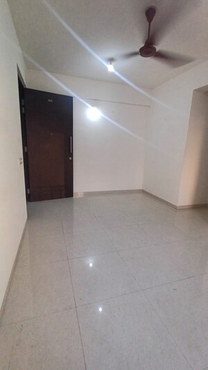 Living Room in 1 BHK Apartment at Blue Bell Hiranandani Estate, Ghodbunder Road – for Sale