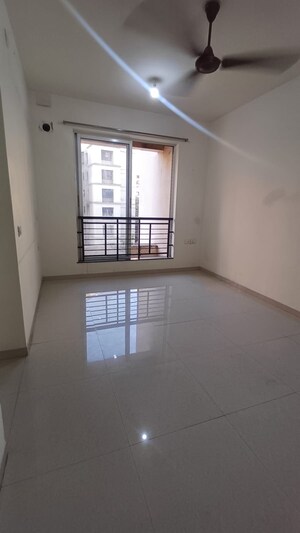 Living Room in 1 BHK Apartment at Blue Bell Hiranandani Estate, Ghodbunder Road – for Sale