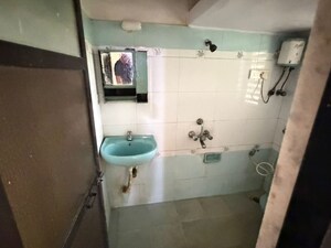 Bathroom in 2 BHK Apartment at Rajhans Dreams, Vasai West – for Sale