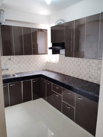 Kitchen in 2 BHK Apartment at JNC The Park, Sector 16c Greater Noida – for Rent
