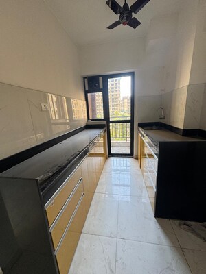 Kitchen in 1.5 BHK Apartment at Runwal Gardens Phase I, Dombivli East – for Sale