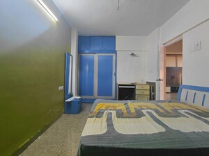 Bedroom in 2 BHK Apartment at Periwinkle Apartment, Malad West – for Rent