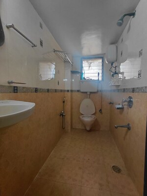 Bathroom in 2 BHK Apartment at Periwinkle Apartment, Malad West – for Rent