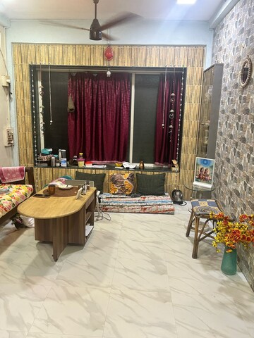 Living Room in 1 RK Apartment at Sai Niketan CHS, Sion – for Sale