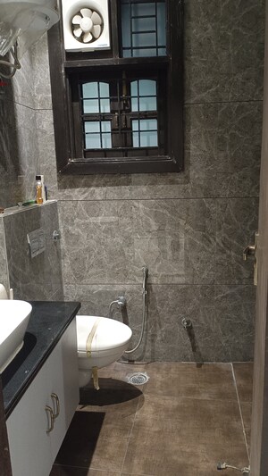 Bathroom in 3 BHK Builder Floor at New Rajinder Nagar – for Sale