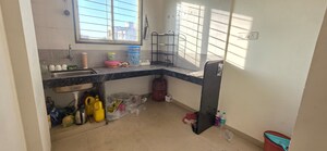 Kitchen in 1 BHK Apartment at Kanan Enclave, Kharadi – for Rent