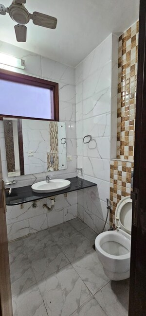 Bathroom in 3 BHK Builder Floor at Greater Kailash I – for Rent