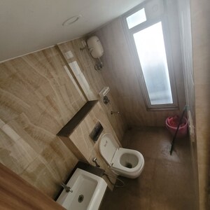 Bathroom in 1 BHK Apartment at Lodha Amara, Kolshet Road – for Rent