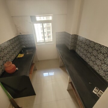 Living Room in 1 BHK Apartment at Lodha Amara, Kolshet Road – for Rent