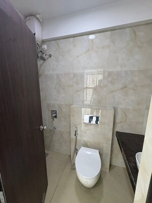 Bathroom in 2 BHK Apartment at Raymond Ten X Habitat, Pokhran Road No Two – for Rent