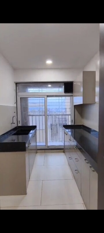 Kitchen in 2 BHK Apartment at Shreenathji Delta Heights, Ulwe Sector 5 – for Sale