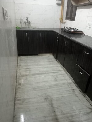 Kitchen in 2 BHK Builder Floor at Indraprastha Colony – for Rent