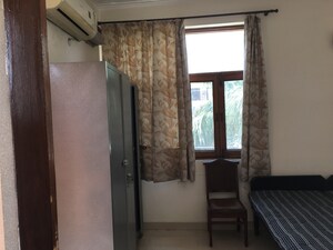 Bedroom in 1.5 BHK Builder Floor at RWA Apartments Sector 12, Sector 12 – for Rent