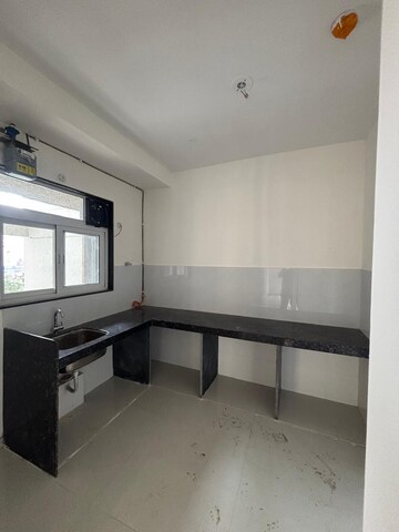 Kitchen in 2 BHK Apartment at Ashar Axis, Majiwada – for Rent