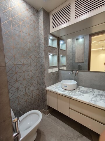 Bathroom in 3 BHK Apartment at Defence Colony – for Rent