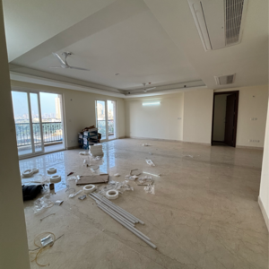 Living Room in 4 BHK Apartment at ATS Triumph, Dhanwapur – for Rent