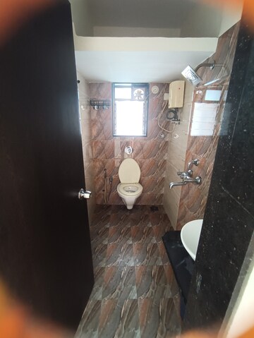 Bathroom in 2 BHK Apartment at Ninaad CHS, Malad West – for Rent