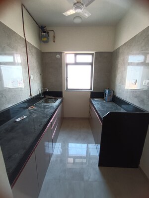 Kitchen in 1 BHK Apartment at Sheth Irene, Malad West – for Rent