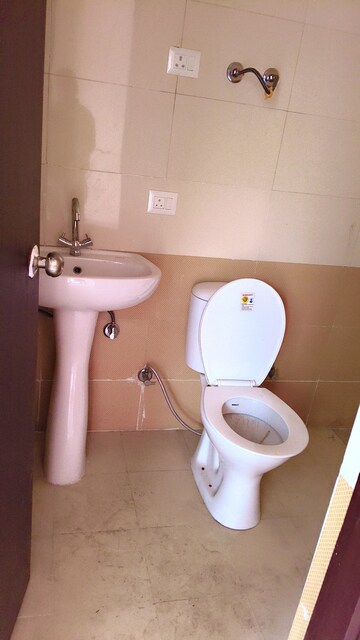 Bathroom in 2 BHK Apartment at Windsor Paradise 2, Raj Nagar Extension – for Sale