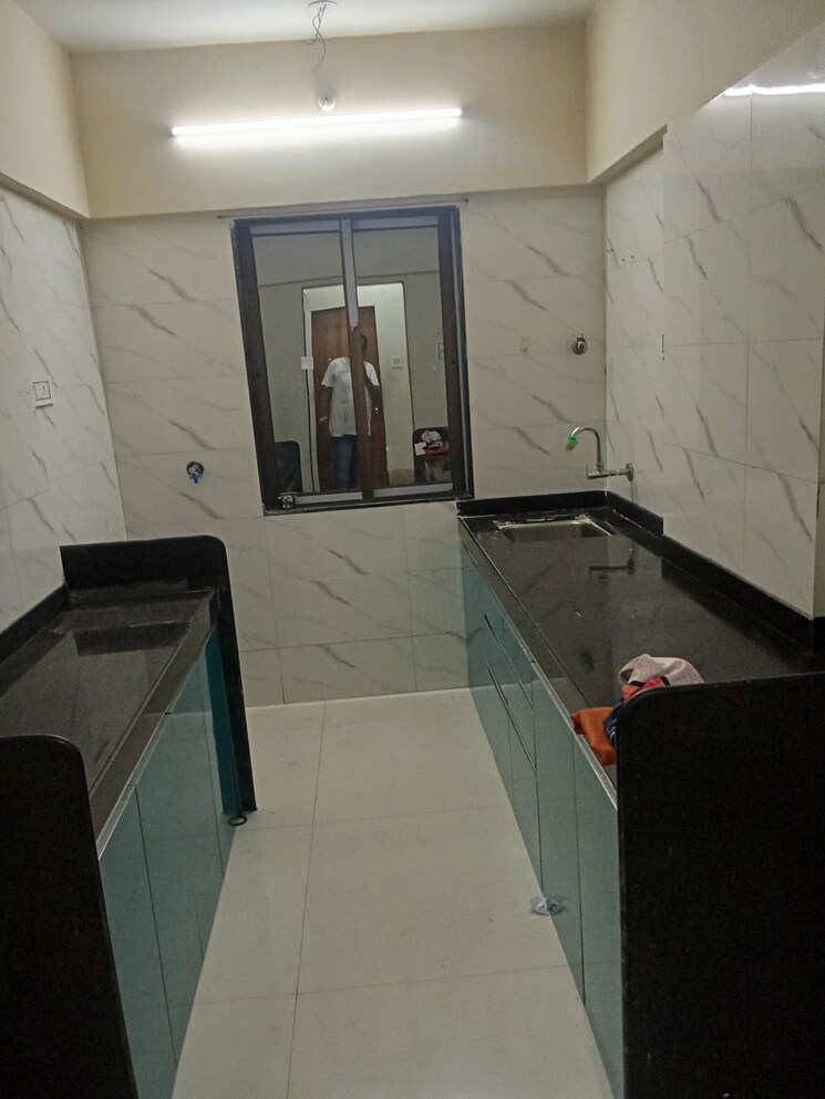 Kitchen, saaga-shri-sai-vishram-chs-ltd 1 Bedroom 462 Sq.Ft. Apartment In Dahisar West Mumbai 9610759