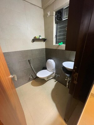 Bathroom in 1 BHK Apartment at Ajmera Valencia, Bhakti Park – for Rent