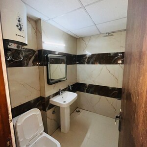 Kitchen in 4 BHK Apartment at Uninav Utopia, Bhuapur – for Sale