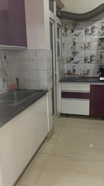 Kitchen in 3 BHK Apartment at Gaur Sportswood, Sector 79 – for Rent