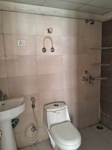 Bathroom in 2 BHK Apartment at Mittal Rajnagar Residency, Raj Nagar Extension – for Rent