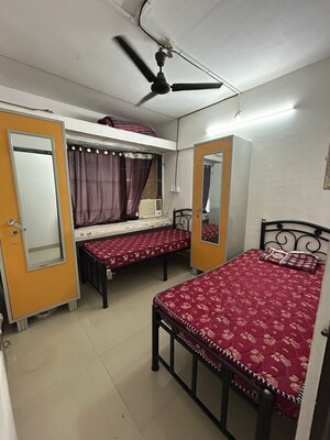 Bedroom in 2 BHK Apartment at Amit Tata Employees CHS, Prabhadevi – for Rent