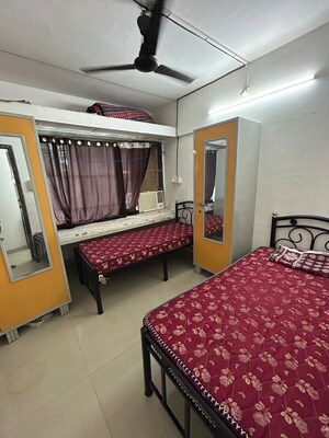 Bedroom in 2 BHK Apartment at Amit Tata Employees CHS, Prabhadevi – for Rent