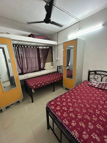 Bedroom in 2 BHK Apartment at Amit Tata Employees CHS, Prabhadevi – for Rent
