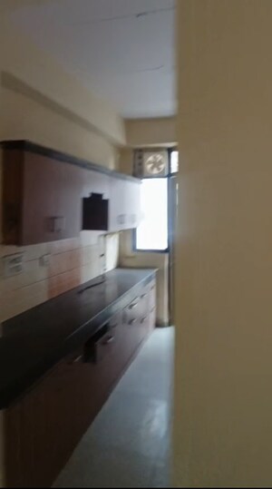Kitchen in 4 BHK Apartment at Ajnara Grace, Raj Nagar Extension – for Rent