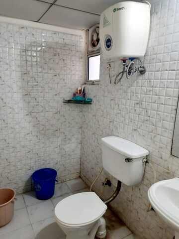 Bathroom in 2 BHK Apartment at Gaur City 6th Avenue, Sector 4 Greater Noida – for Rent