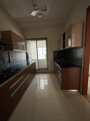 Kitchen in 2 BHK Apartment at Ajmera Zeon, Bhakti Park – for Rent