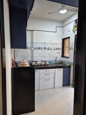 Kitchen in 1 BHK Apartment at Sukur Garden, Dhokali – for Sale