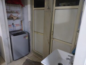 Bathroom in 1 BHK Apartment at Monarch Palace, Andheri East – for Sale