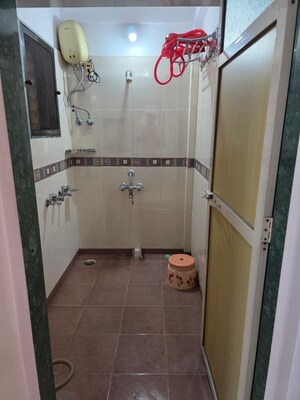 Bathroom in 1 BHK Apartment at Yashraj Park CHS, Kasarvadavali – for Sale