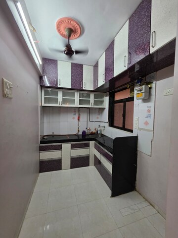 Kitchen in 1 BHK Apartment at Yashraj Park CHS, Kasarvadavali – for Sale