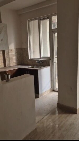 Kitchen in 2 BHK Apartment at Amrapali Golf Homes, Sector 4 Greater Noida – for Rent