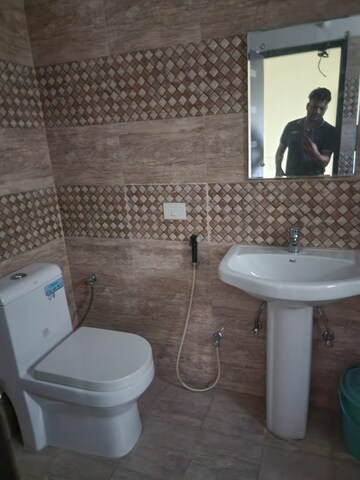 Bathroom in 3 BHK Apartment at Faizabad Road – for Rent
