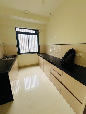 Kitchen in 2 BHK Apartment at Dynamix Divum, Malad East – for Sale