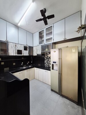 Kitchen in 3 BHK Apartment at Bredco New Viceroy Park , Kandivali East – for Rent