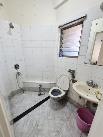 Bathroom in 3 BHK Apartment at Bredco New Viceroy Park , Kandivali East – for Rent