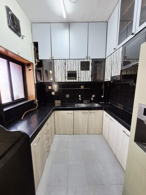 Kitchen in 3 BHK Apartment at Bredco New Viceroy Park , Kandivali East – for Rent