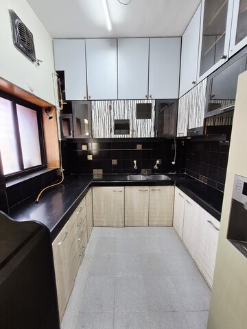 Kitchen in 3 BHK Apartment at Bredco New Viceroy Park , Kandivali East – for Rent