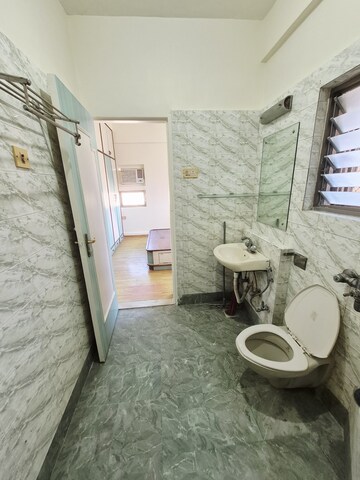 Bathroom in 3 BHK Apartment at Bredco New Viceroy Park , Kandivali East – for Rent
