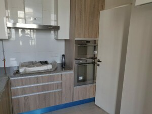 Kitchen in 3 BHK Apartment at DLF The Primus, Sector 82a – for Sale