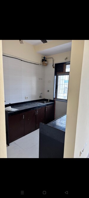 Kitchen in 3 BHK Apartment at Sheth Vasant Athena, Laxmi Nagar – for Rent
