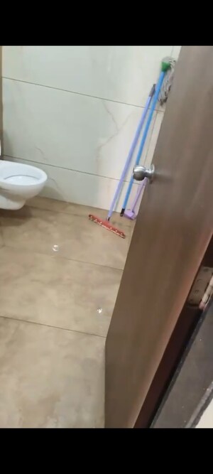 Bathroom in 1 BHK Apartment at Raunak Unnathi Woods, Ghodbunder Road – for Rent